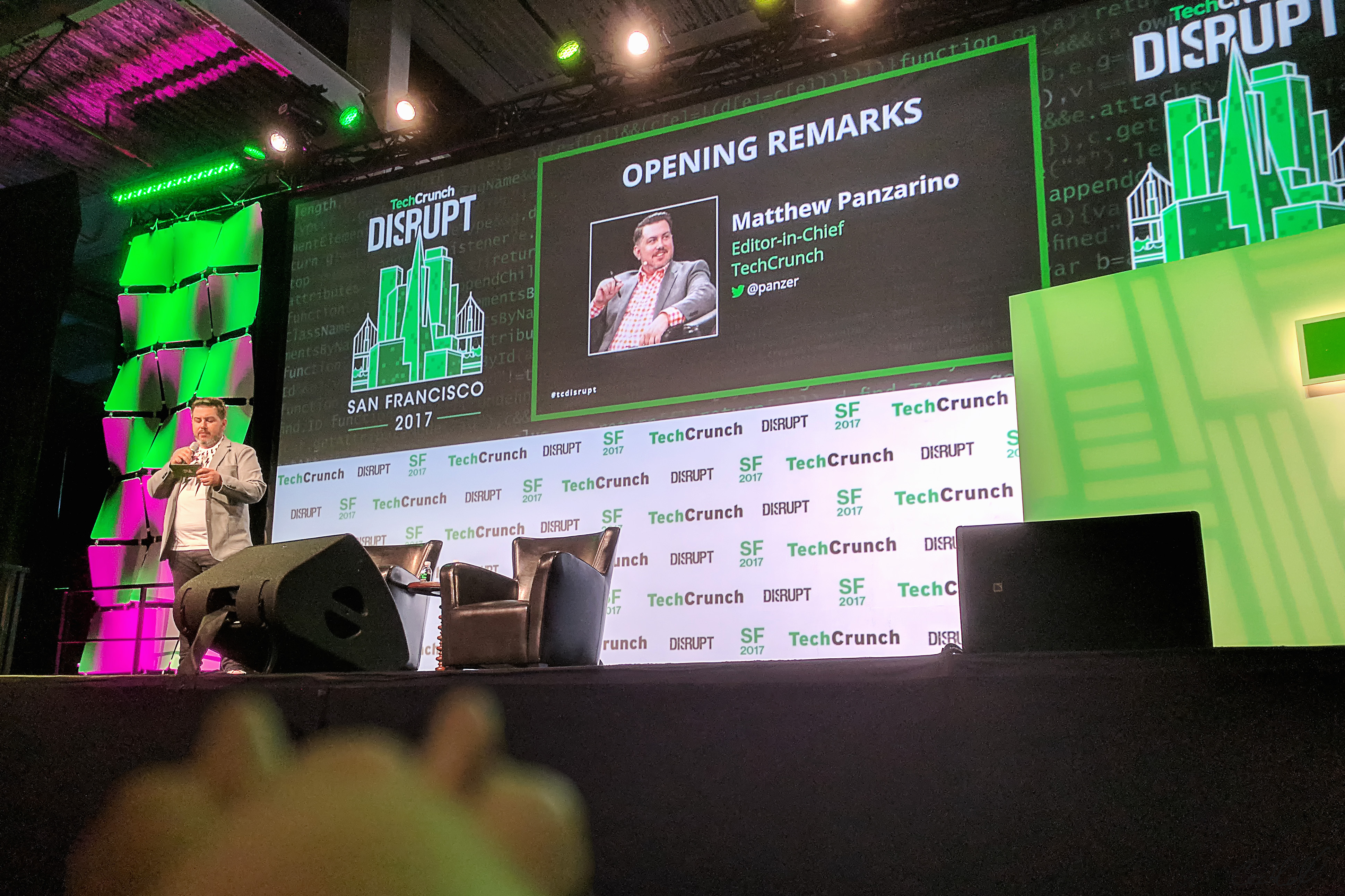 A photo of Bella the duck seated next to the stage at TechCrunch Disrupt, San Francisco